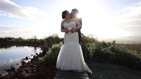 Kissing Next To The Dam Stock-Footage 114885567