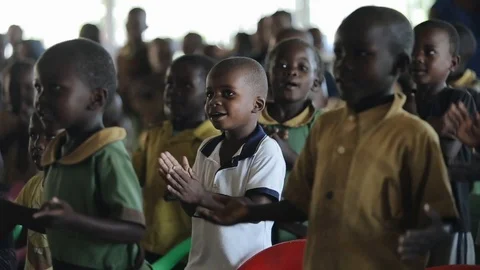 KISUMU,KENYA - MAY 19, 2018:Group of african children dancing, smiling and Stock Footage