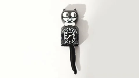Kit Cat Clock On A White Wall 4k Stock Footage 166577772