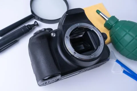 Kit for cleaning the camera from dust on a white background Stock Photos