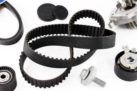 Kit of timing belt with rollers and pump on a white background Stock Photos