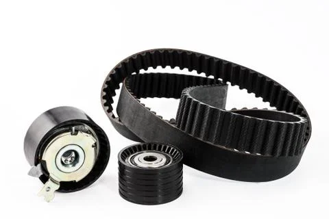 Kit of timing belt with rollers on a white background Stock Photos