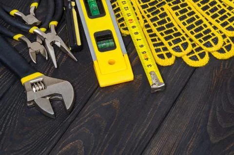Kit tools for master builder on a black boards. Wizard working environment Stock Photos