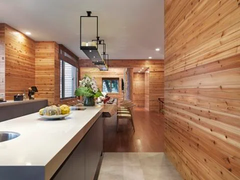 Kitchen and dining room table in cabin home Stock Photos
