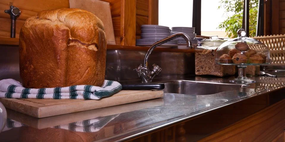 Kitchen and fresh bread Stock Photos