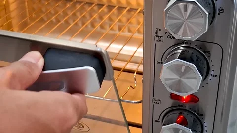Kitchen Appliance in Use Preheating Oven with Cooking Icons Stock Footage 342783531