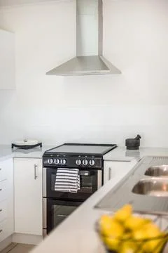 Kitchen Area with an Oven, Clean Platform and Chimney 스톡 사진