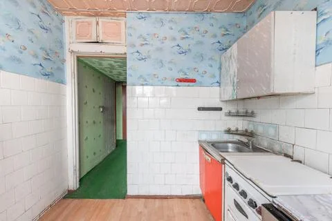Kitchen in bad condition in an abandoned building. Abandoned house interior.. Stock Photos