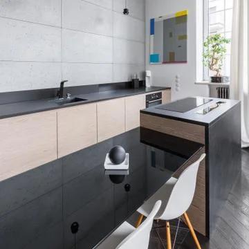 Kitchen with black countertop Stock Photos