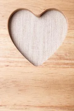 Kitchen board with heart shape as border frame Foto stock
