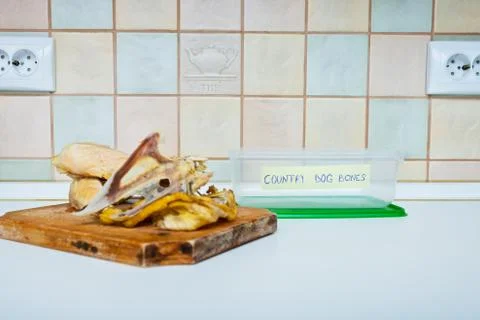 Kitchen bones container for dogs Stock Photos