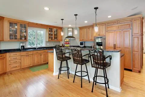 Kitchen with breakfast bar Stock Photos