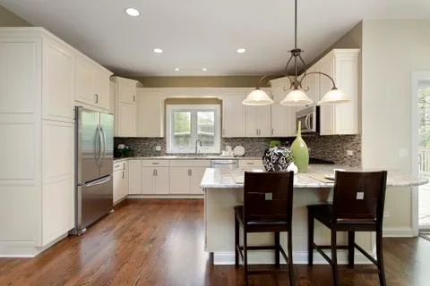 Kitchen with breakfast bar Stock Photos