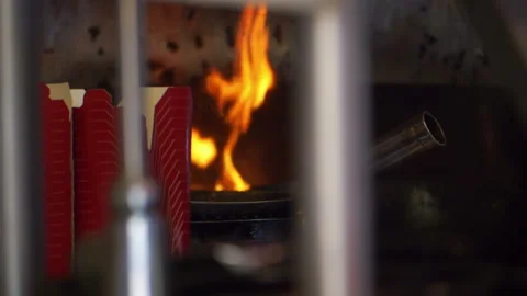 Kitchen burner in the restaurant in slow motion 180fps Stock Footage 107968538