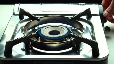 The kitchen burner turns on. Stock Footage 145911117