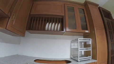 A kitchen cabinet corner pan view Stock Footage 97208254
