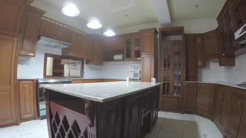 Kitchen cabinet diagonal view. and set mugs Stock Footage 97229917