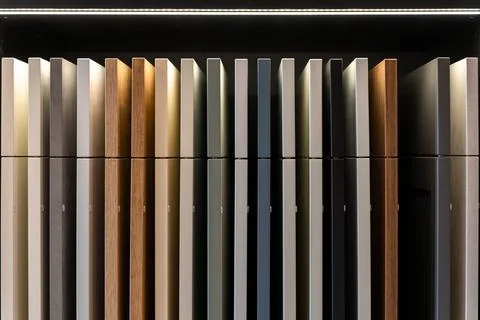 Kitchen cabinet samples on shelf with reflective display. Modern interior d.. Stock Photos
