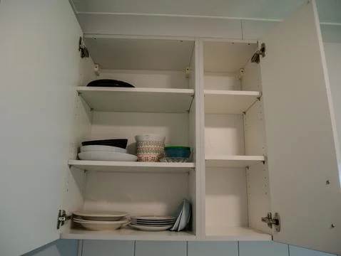 Kitchen Cabinet Shelves with Kitchenware, Storage Organization Interior Foto stock