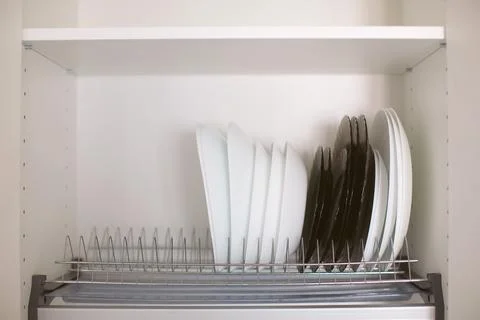 Kitchen cabinet storage idea. Stock Photos