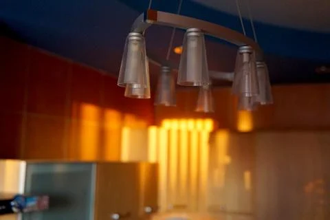 Kitchen cabinets in the rays of the setting sun Stock Photos