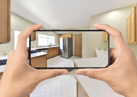 Kitchen with cell phone Foto stock