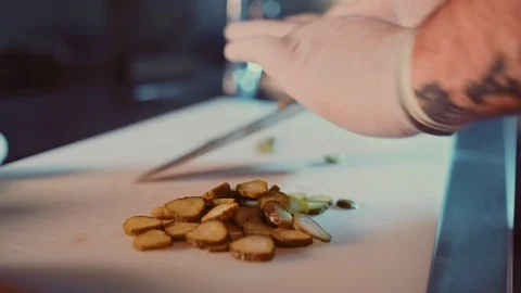Kitchen chef cutting cucumber on the cutting board Stock Footage 104195510