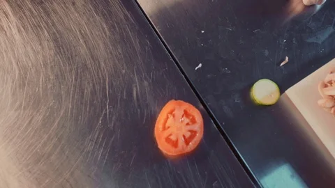 Kitchen chef cutting leek with a knife on the board Stock Footage 104199152
