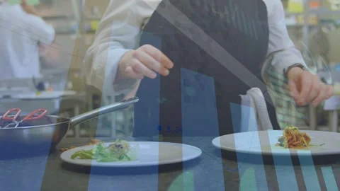 Kitchen chef reaching for tongs and plating garnish, chart overlay guiding Stock Footage 333575342