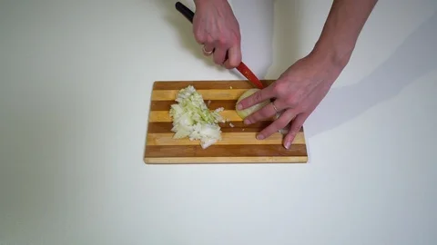 Kitchen. Close-up. A young woman is preparing food. Hands of the girl close-up Video stock 94453016
