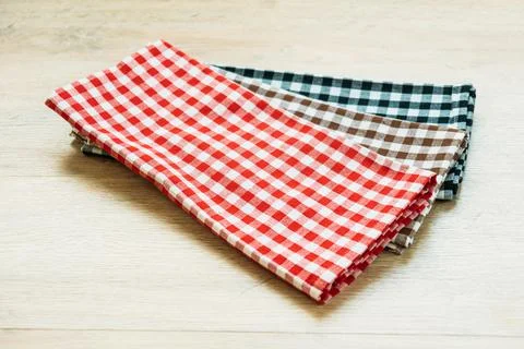 Kitchen cloth on wood table Stock Photos
