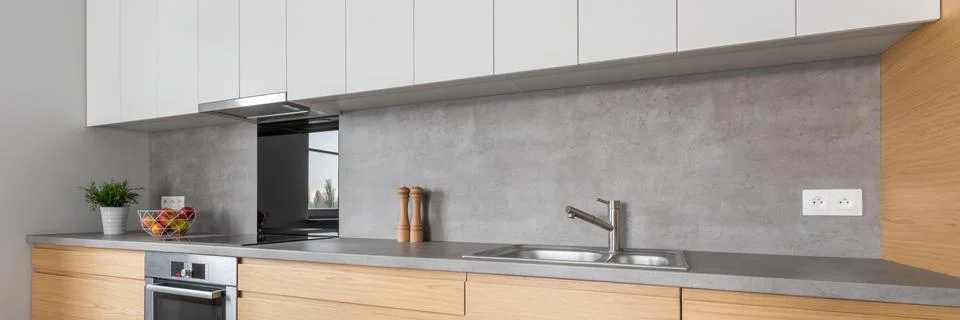 Kitchen with concrete worktop Stock Photos