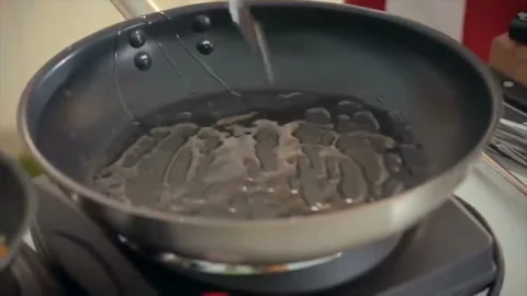 Kitchen . Cooking meat. Stock Footage 141446654