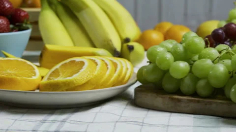 Kitchen counter filled with fruit - closeup tracking shot Stock Footage 341184878