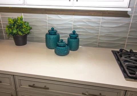 Kitchen Counter With Three Decorative Containers Stock Photos