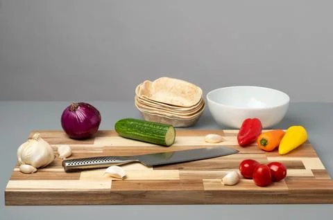 Kitchen Counter with Vegetables and Knife Foto stock