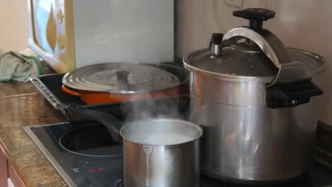 Kitchen countertop with a boiling pot em... | Stock Video | Pond5