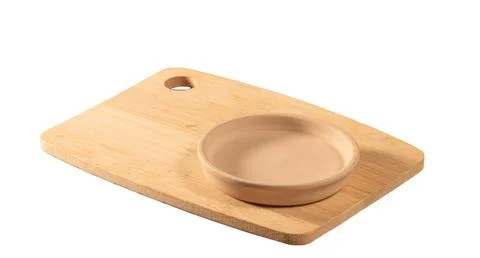 Kitchen cutting board and clay saucer,isolate on white background Stock Photos