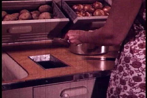 A kitchen is designed for maximum efficiency and space saving in the 1940s Video stock 99843939