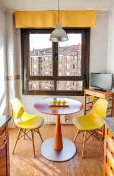Kitchen with dining area next to the window Stock Photos