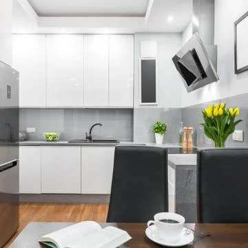 Kitchen with dining table Stock Photos