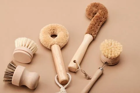 Kitchen Dish Brushes in Brown Ceramic Cup Stock Photos