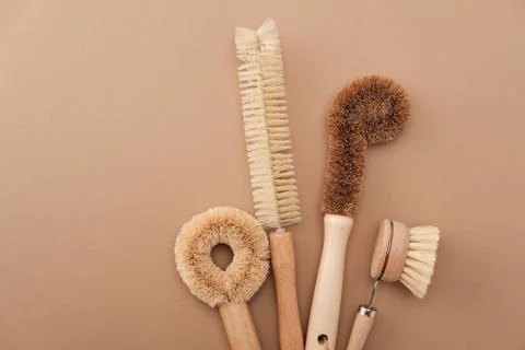 Kitchen Dish Brushes in Brown Ceramic Cup Stock Photos
