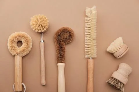 Kitchen Dish Brushes in Brown Ceramic Cup Stock Photos