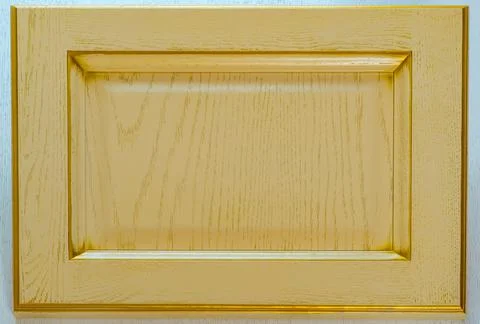 Kitchen door front from solid oak wood covered with shabby chic beige paint a Stock Photos