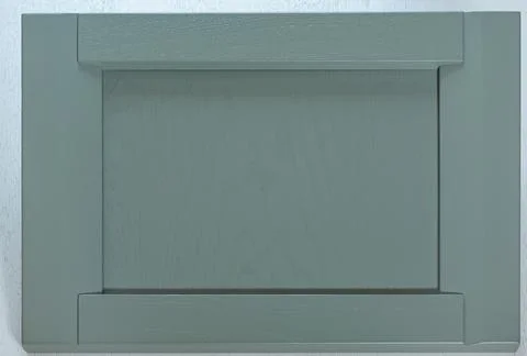Kitchen door front from solid oak wood covered with gray paint in the Scandin Stock Photos
