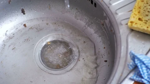 Kitchen Drain Clogging up with Food Particles Stock Footage 74141855