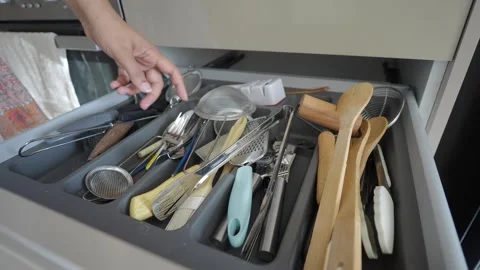 Kitchen drawer with mixed utensils and tools Stock Footage 343654276
