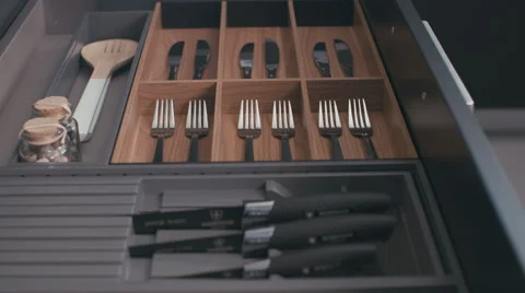 Kitchen drawer with silverware closing Stock Footage 63498672