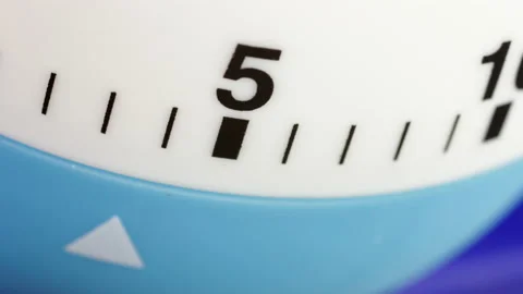 Kitchen egg timers countdown time lapse. Clockwork cooking time measurement. Video stock 143916845